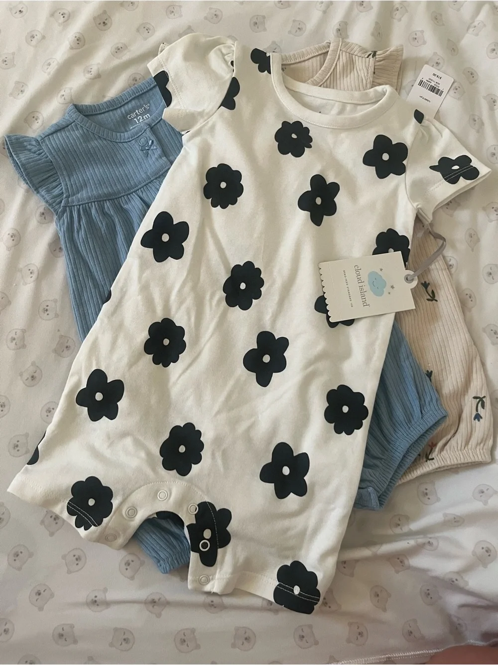 2 Carter's Ribbed Romper and a Cloud Island Romper size 12m